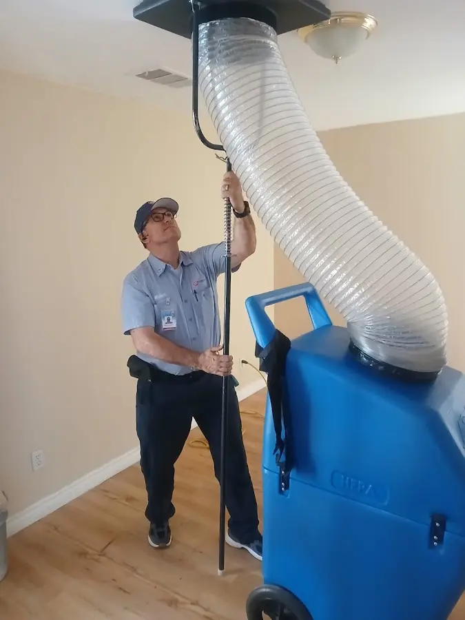 HVAC Installation technician using HEPA equipment in Hermitage